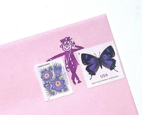 Mr Zip Leaning Rubber stamp