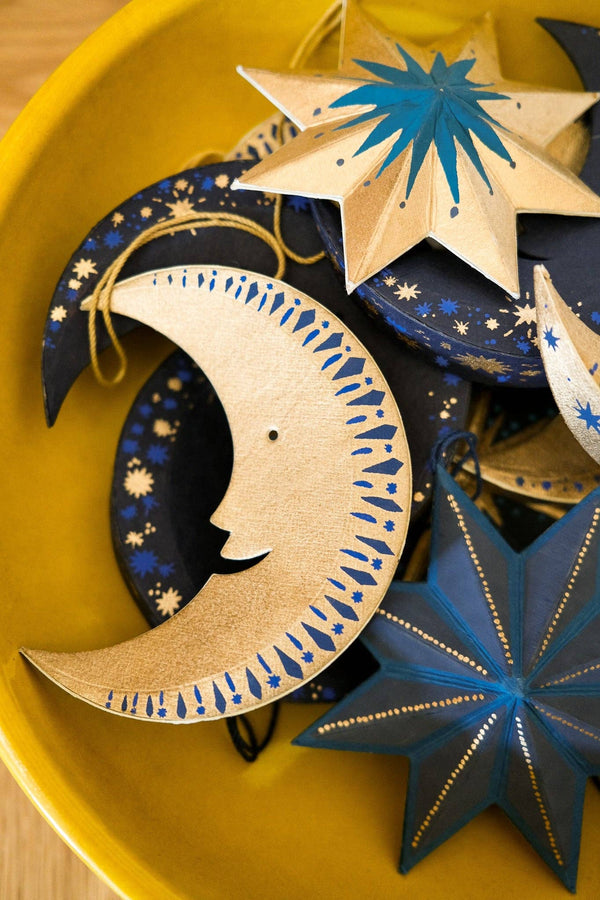 GOLDEN MAN ON THE MOON BOARD ORNAMENT