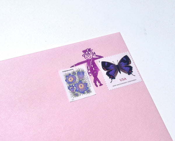 Mr Zip Leaning Rubber stamp