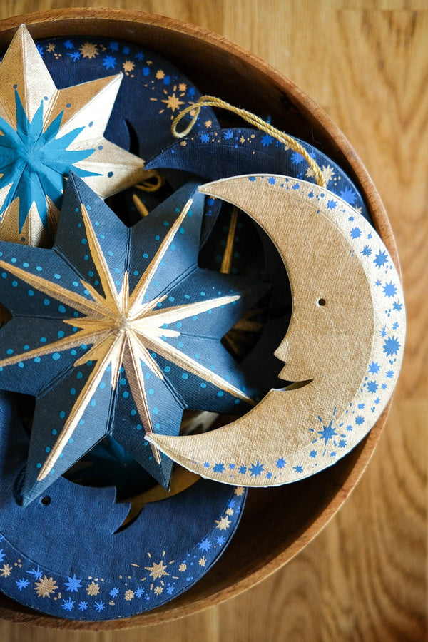 SHIMMERING MAN ON THE MOON BOARD ORNAMENT