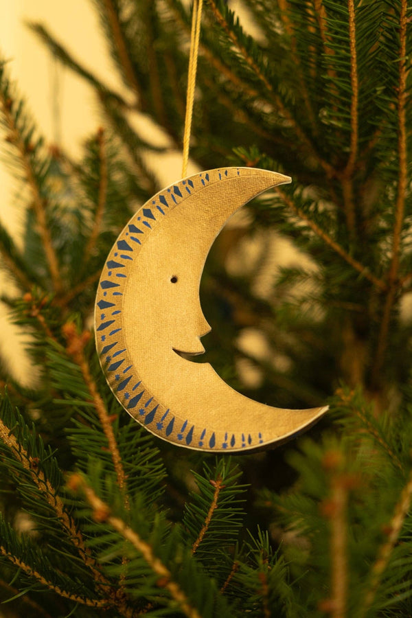 GOLDEN MAN ON THE MOON BOARD ORNAMENT